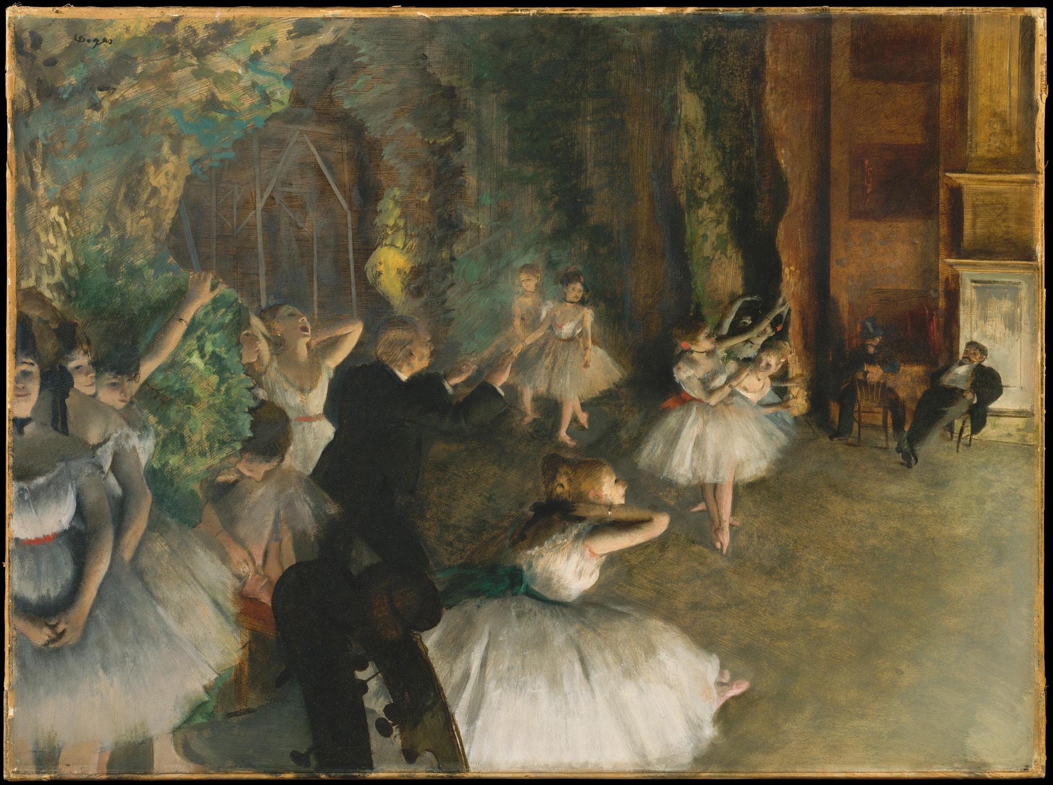 The Rehearsal of the Ballet Onstage by Edgar Degas (ca. 1874) featuring Ballet master/conductor with baton, Double bass, Abonnés (subscribers) in the wings, Footlights/gaslight glow