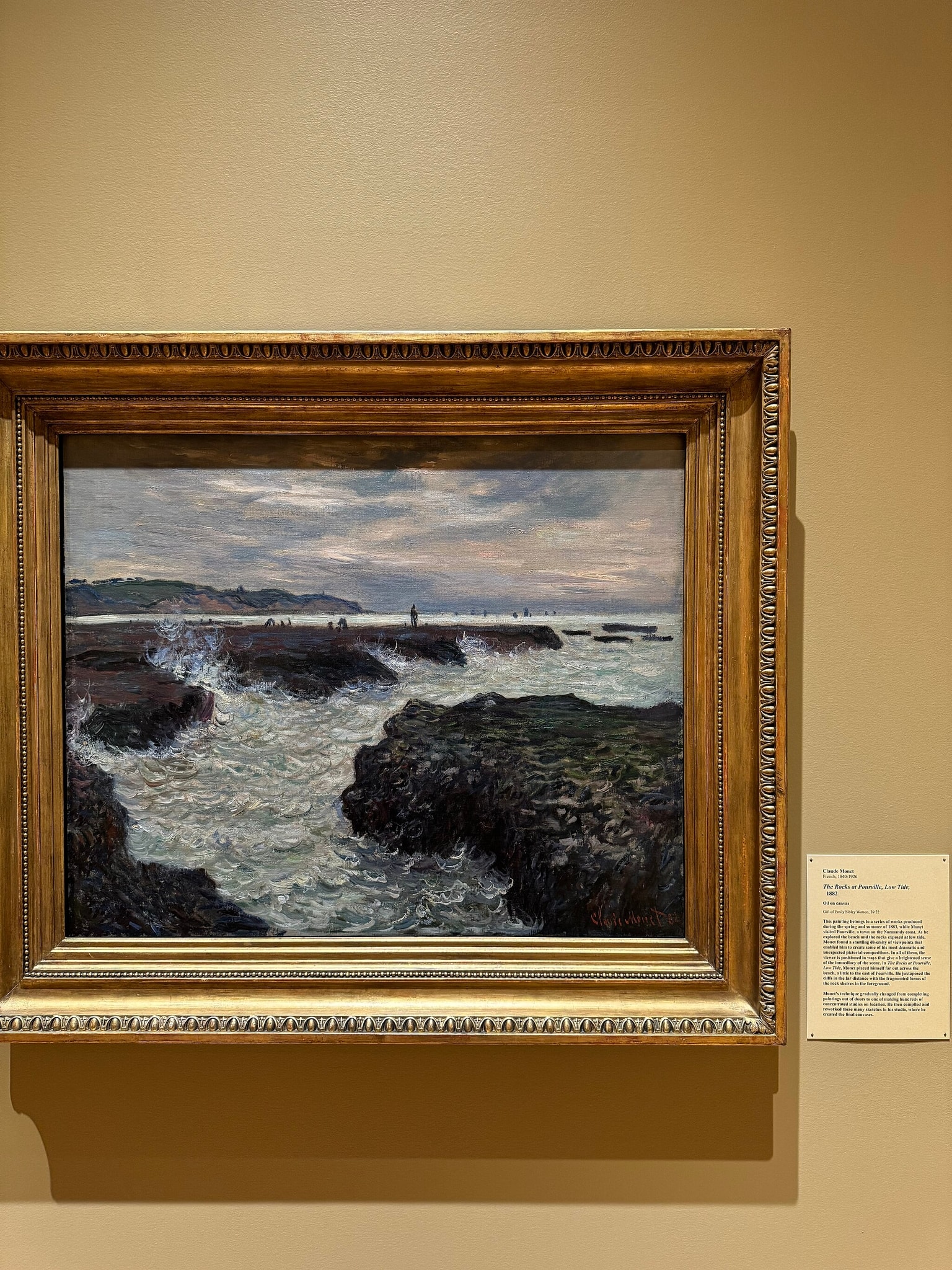 Click numbered symbols to learn about their meaning The Rocks at Pourville, Low Tide by Claude Monet (1882) featuring Jagged, seaweed-dark rock ledges, Churning white surf, Pewter, overcast sky, Human silhouettes on the horizon